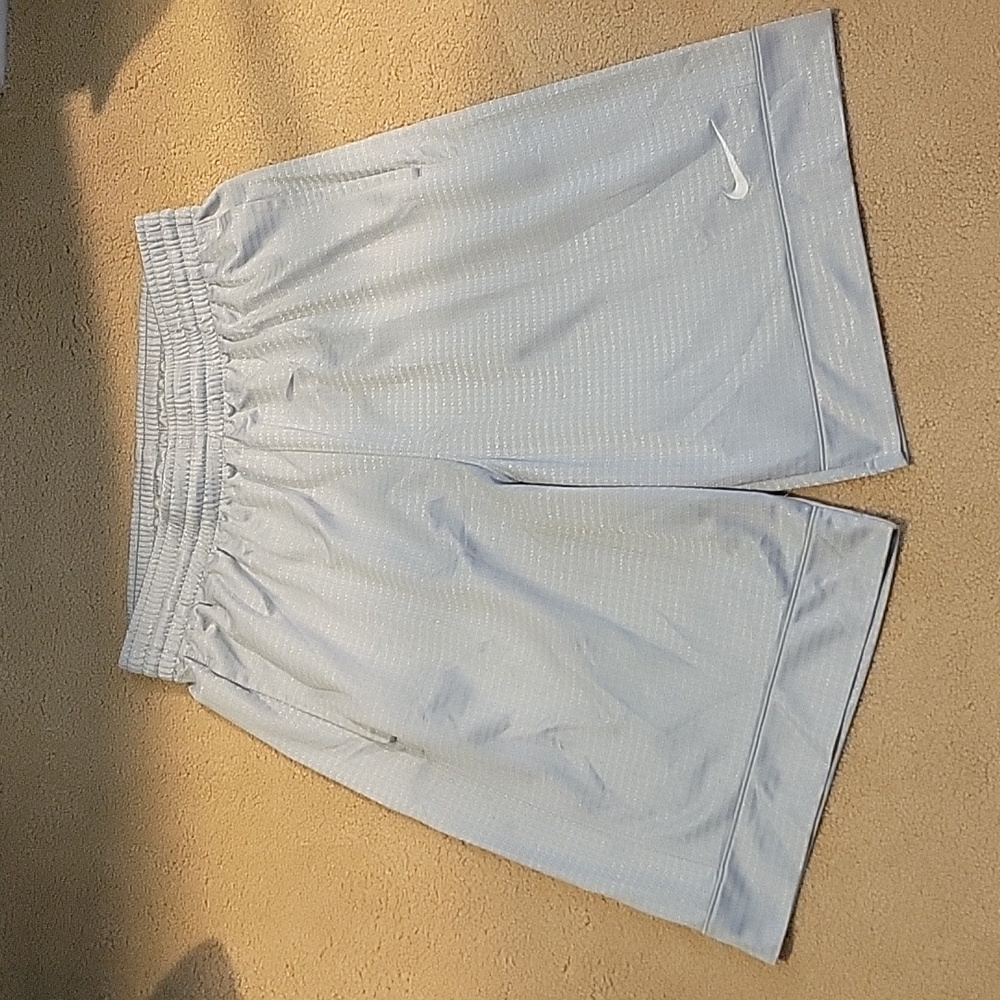 Nike men's med grey 9" basketball sports shorts. Wide hem on legs.  Drawstring.